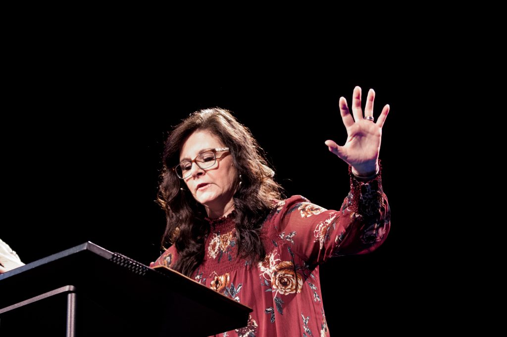 Lady preaching in chapel